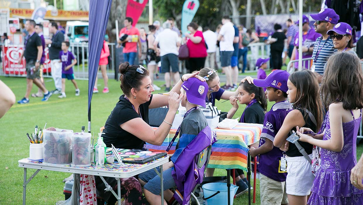 Community - face painting at Kids' Zone